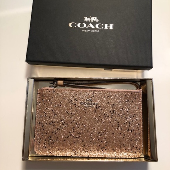 Coach Handbags - Coach glitter small wristlet. NWT.